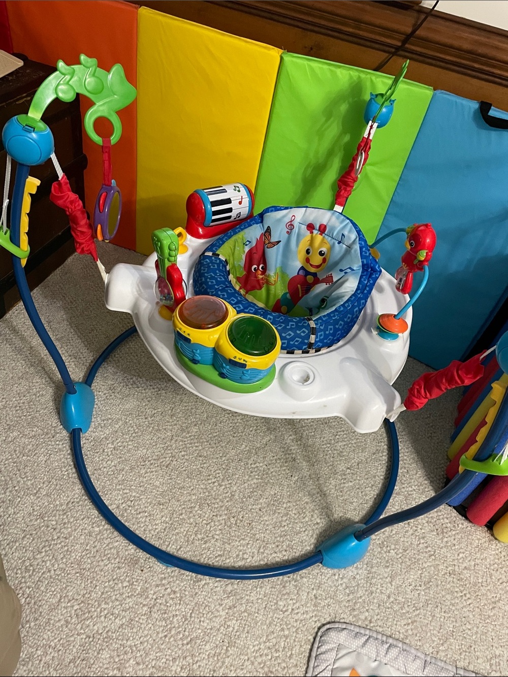 Fisher-Price Colorful Musical Activity Jumper - Blue/Green/Red/Yellow